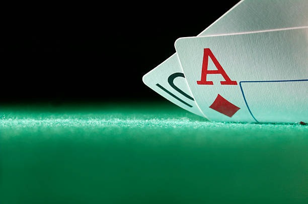 Professional dealer managing poker table